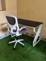 Executive Metallic Desk with White Ergonomic Chair for Stylish and Comfortable Workspaces