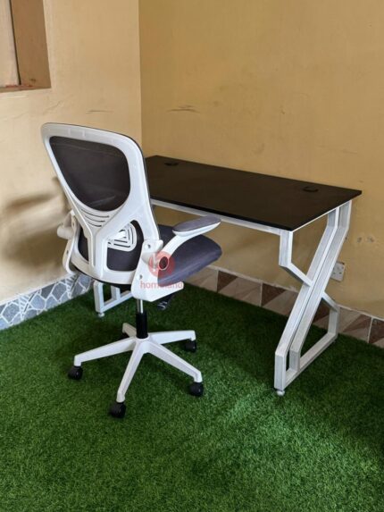 Executive Metallic Desk with White Ergonomic Chair for Stylish and Comfortable Workspaces
