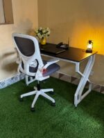 : Executive Metallic Desk with White Ergonomic Chair for Stylish and Comfortable Workspaces