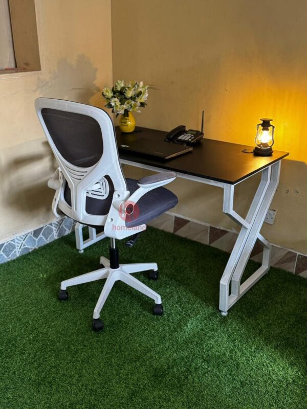 : Executive Metallic Desk with White Ergonomic Chair for Stylish and Comfortable Workspaces