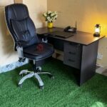 Office Desk with Executive Recliner Leather Chair for Luxurious and Comfortable Workspaces
