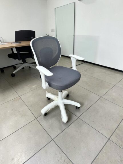 White and grey ergonomic mesh office chair with armrests and swivel wheels